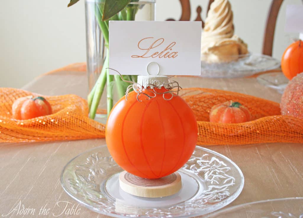 pumpkin place card holders on table