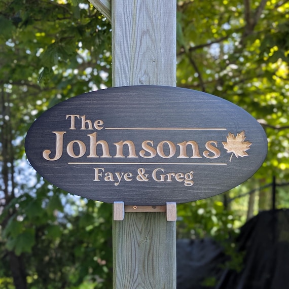 maple leaf carved wood sign