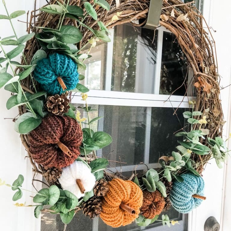crochet pumpkin wreath on front door