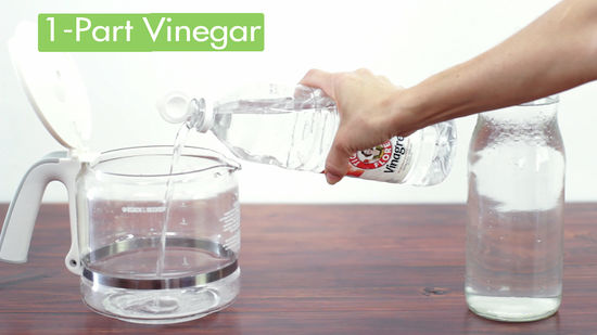 vinegar poured into coffee maker reservoir
