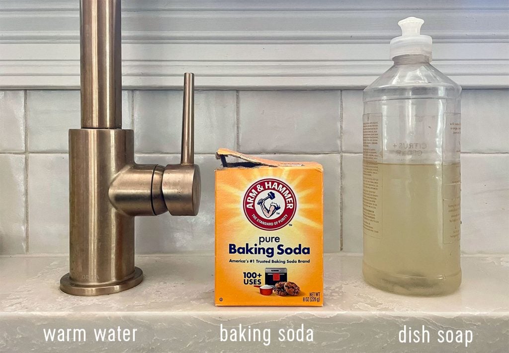 baking soda sink scrubbing stainless steel
