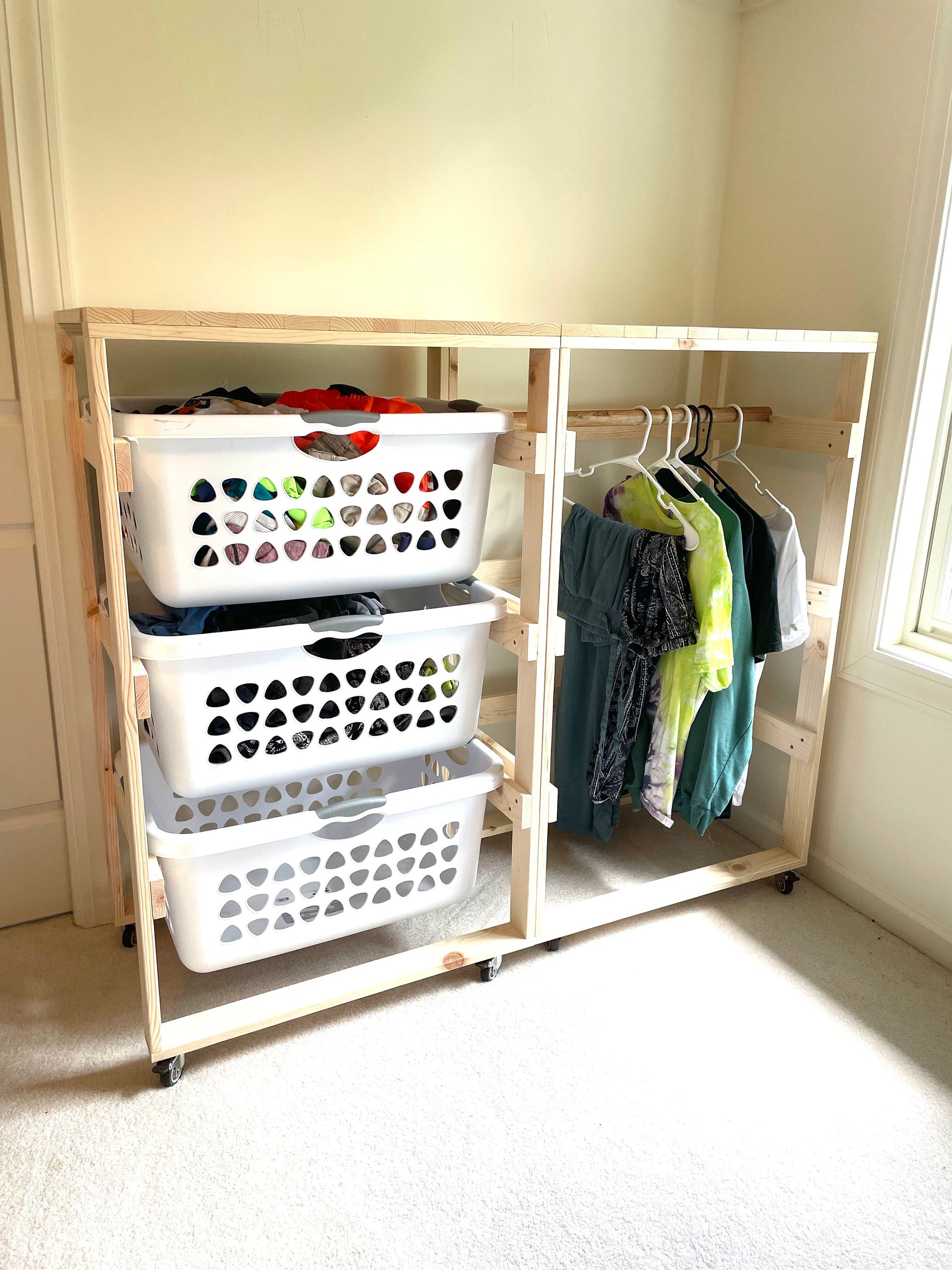 laundry basket of clothes next to closet