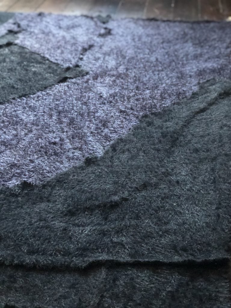 upcycled sweater braided rug