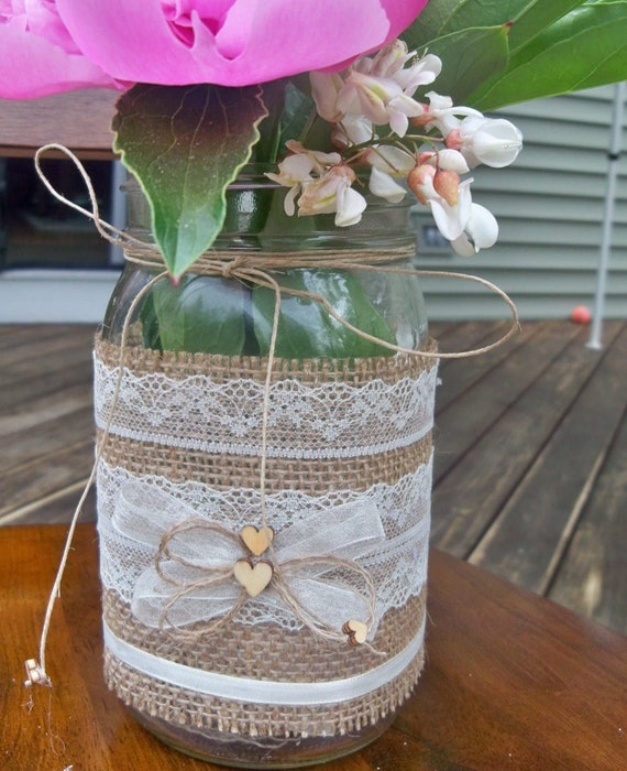 burlap wrapped mason jar vase with winter flowers