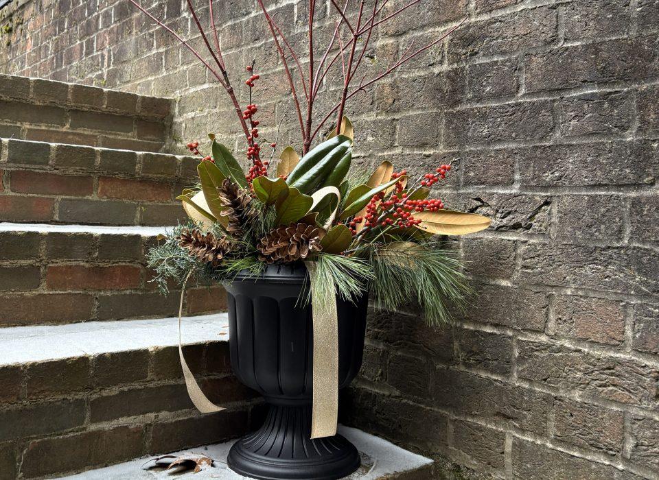 winterberry branch winter container on porch