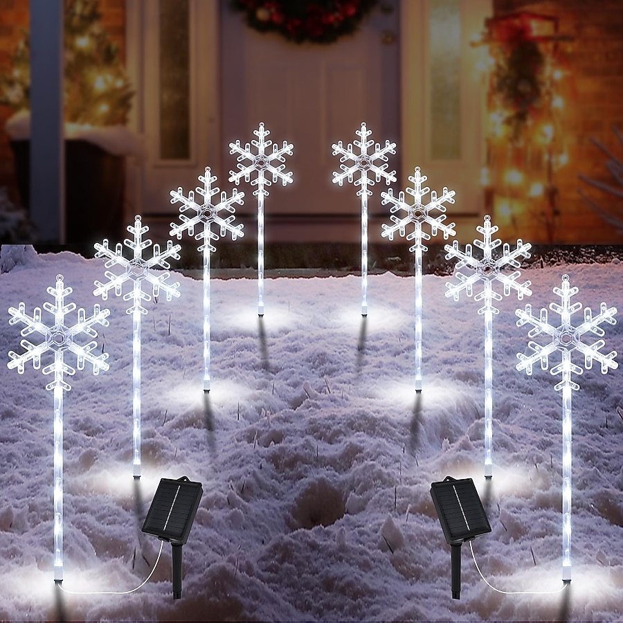 solar lantern path in winter garden