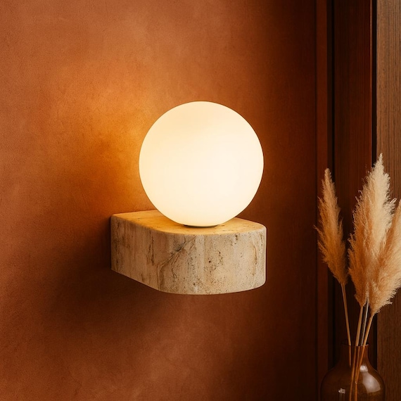 frosted glass lantern on stone wall