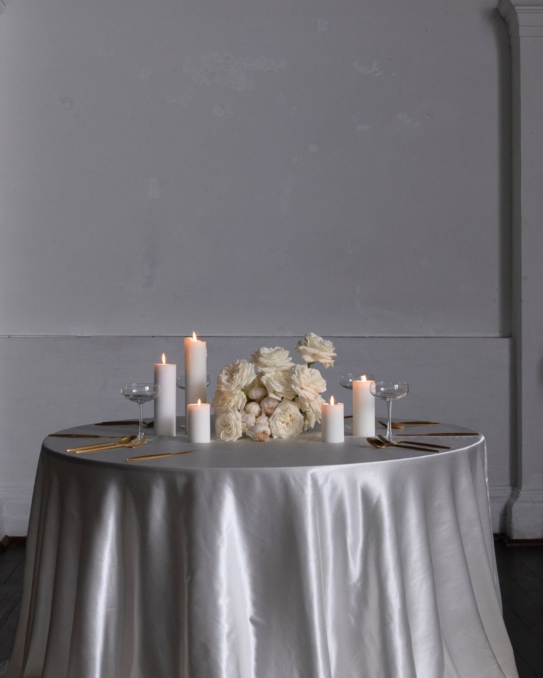 round table with pillar candles