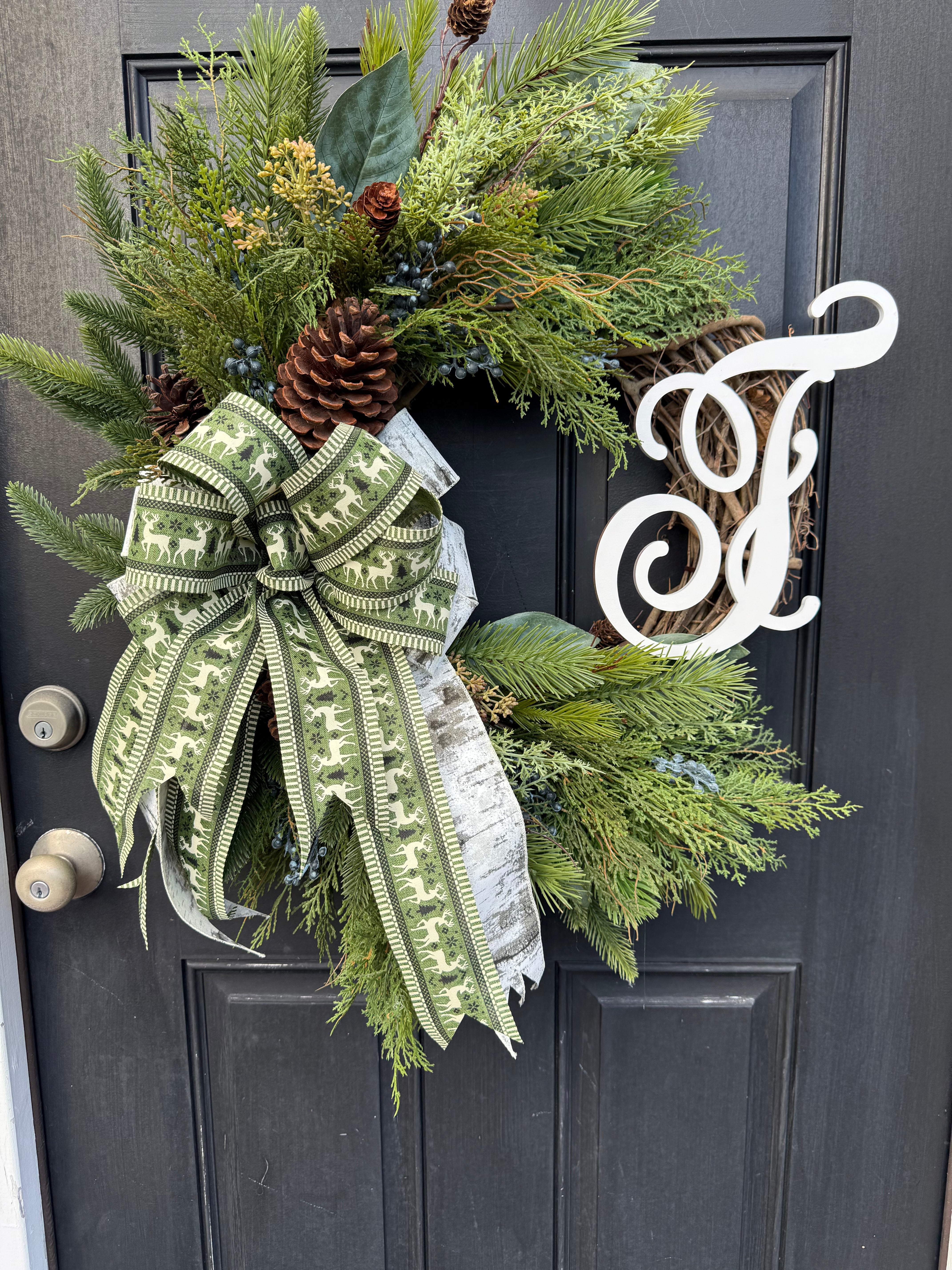 monogram winter wreath on door