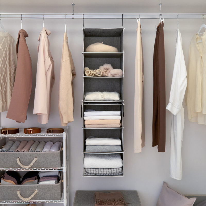 hanging closet organizer with throw pillows