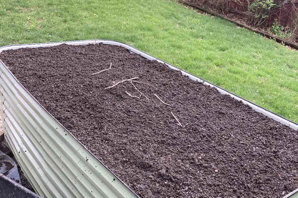 raised garden bed mulched for winter