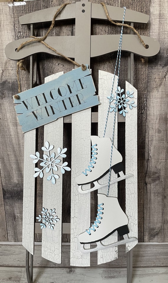 vintage sled on winter porch