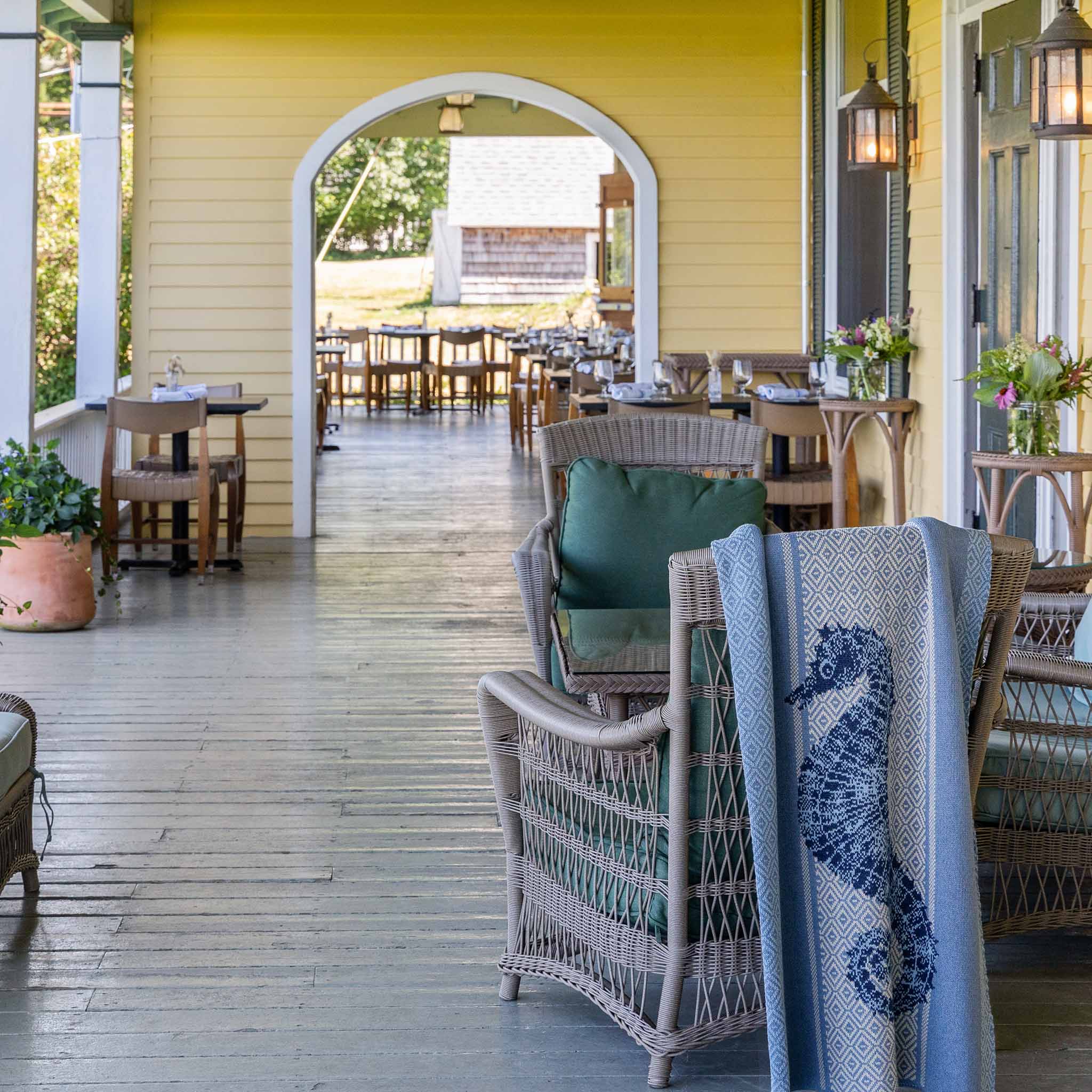 knit blanket on porch chair