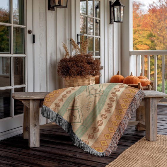cotton throw blanket on wooden bench