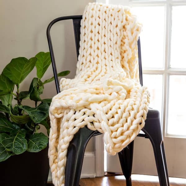 acrylic throw blanket on window seat