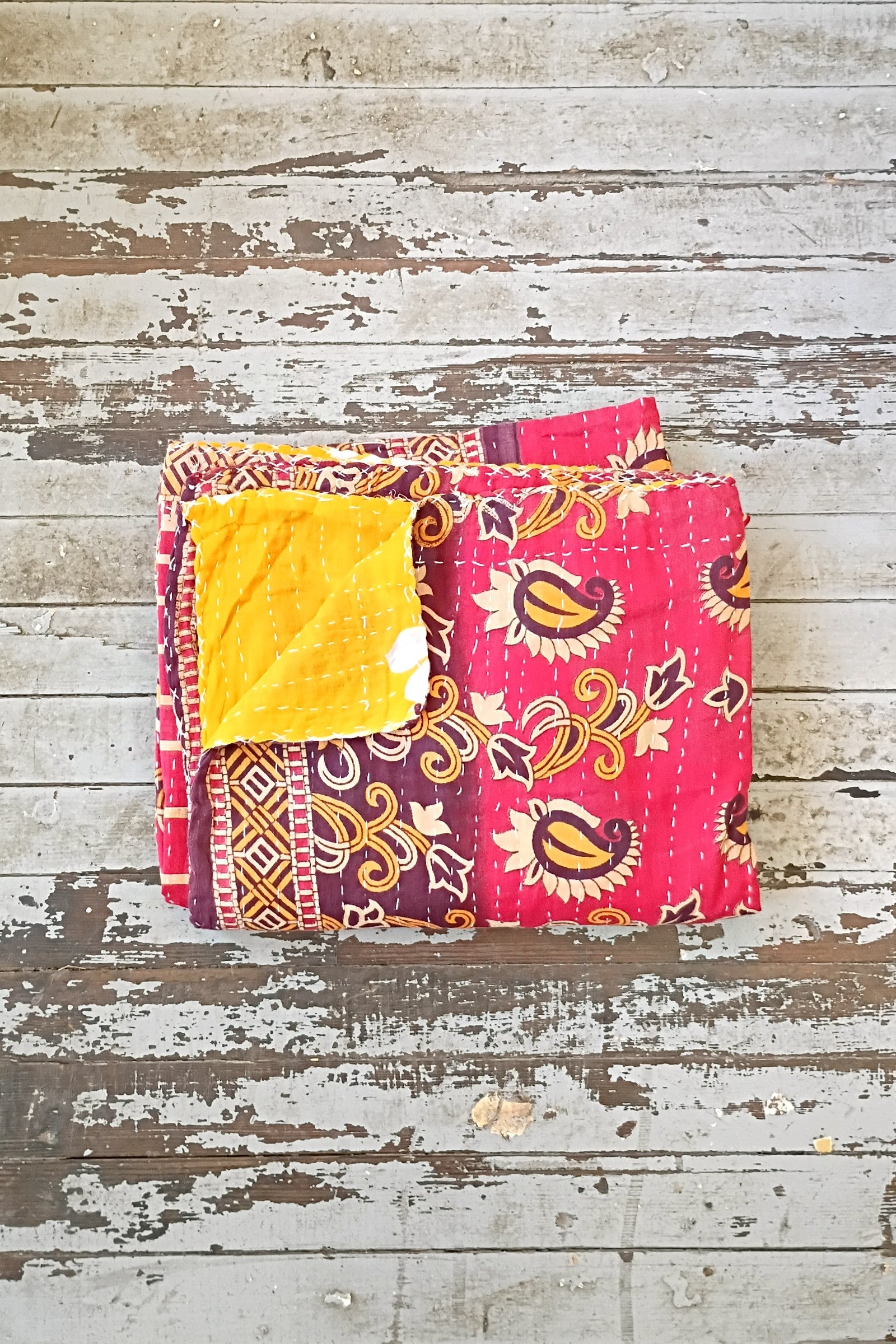 throw blankets in different fabrics side by side