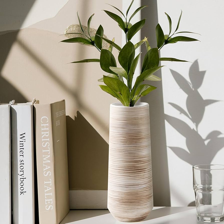 white ceramic vases on winter shelf