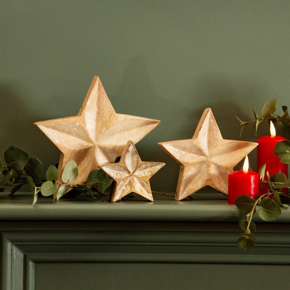 whitewashed wooden decor on winter shelf
