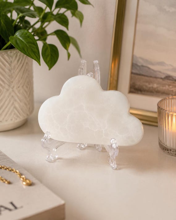 white glass and crystal decor on shelf