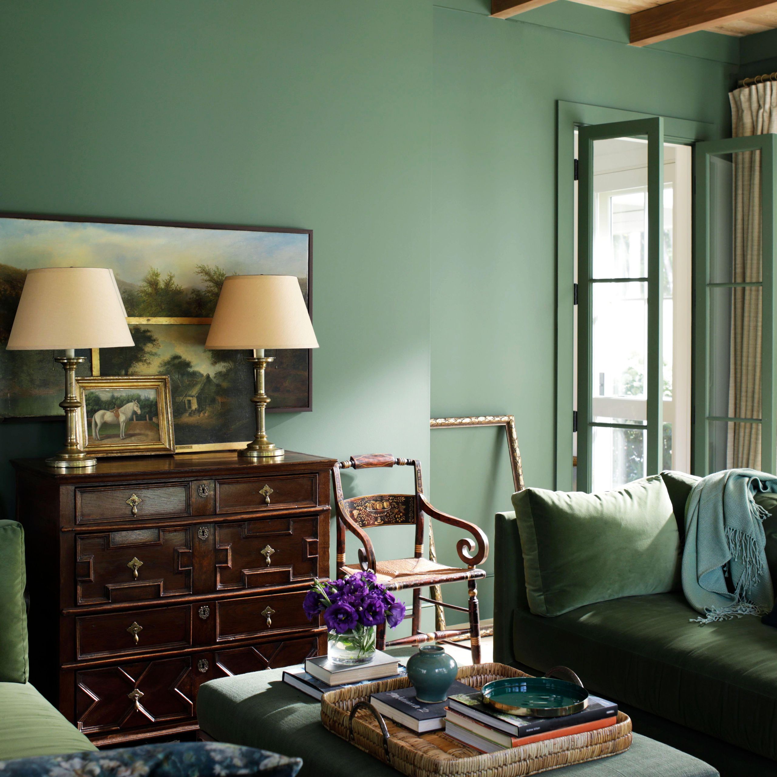 forest green painted sideboard in living room