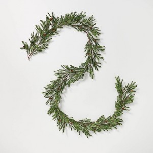 pinecone garland along hearth