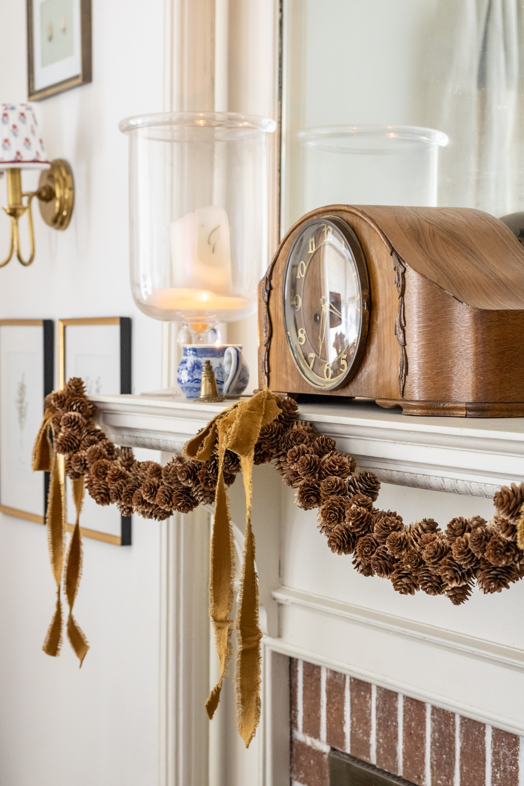 pinecone garland wrapped on chandelier