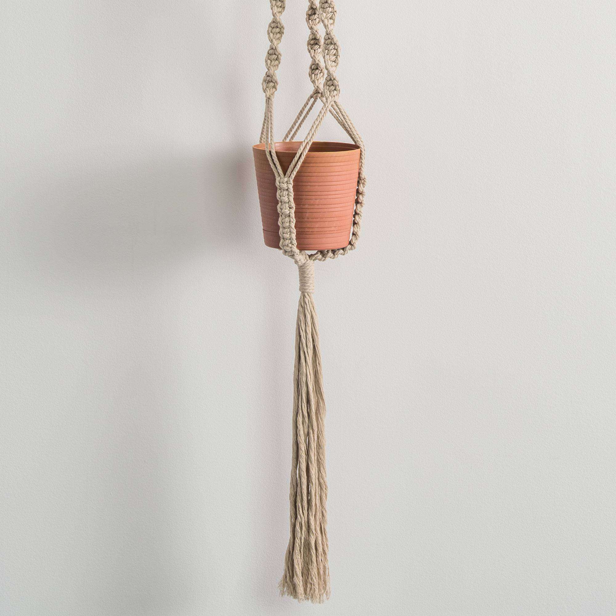 macrame plant hanger with leather accents