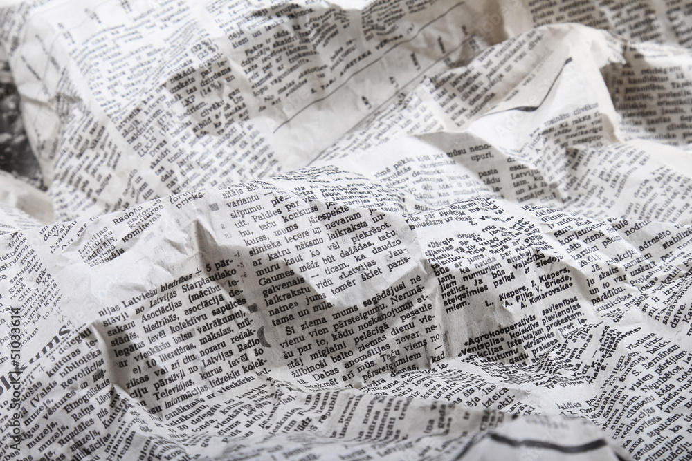 crumpled newspaper