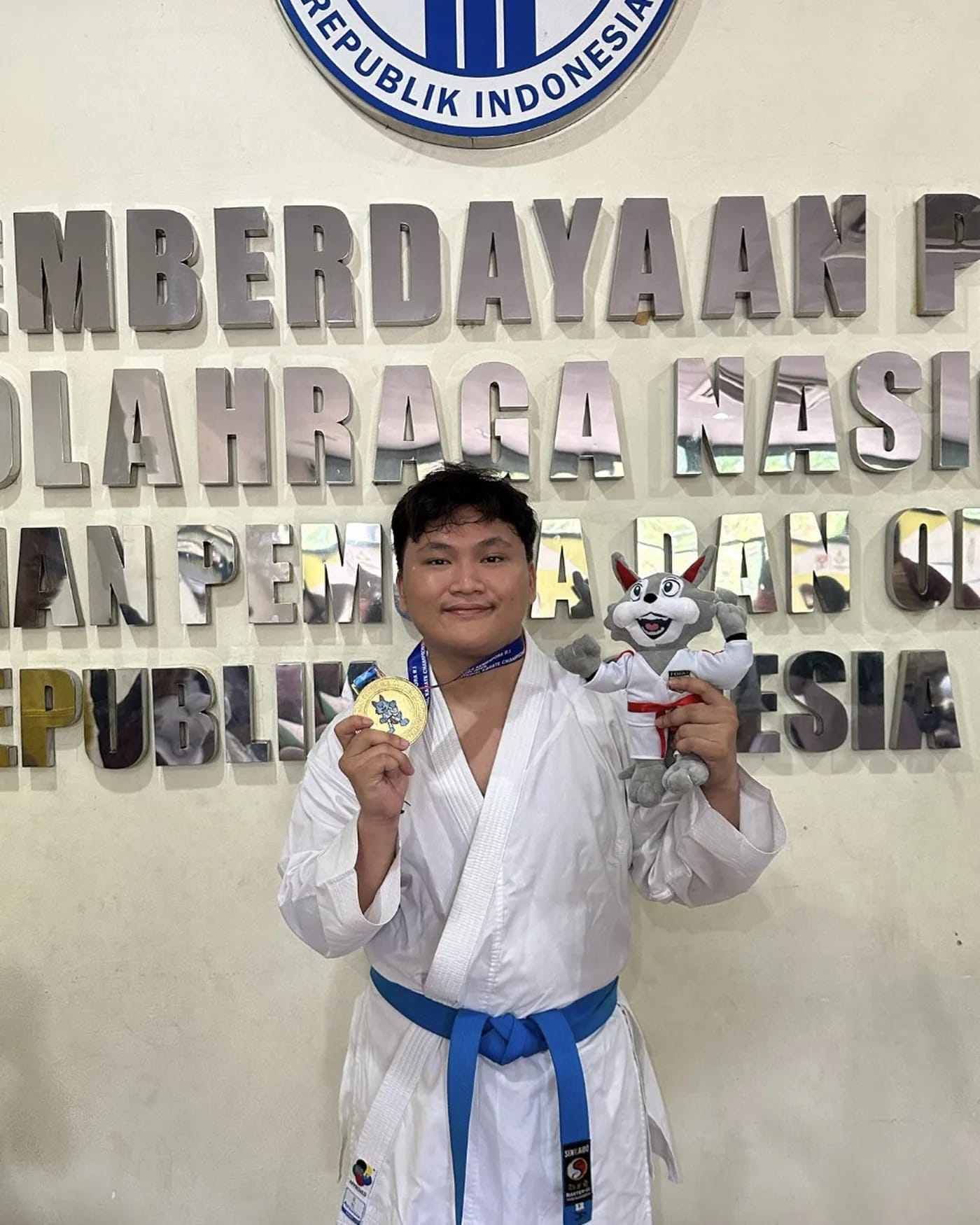 Arrow with his medal at the Piala Kemenpora karate championship, 2023