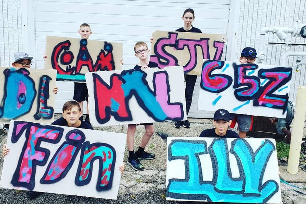 TIM campers with graffiti name art