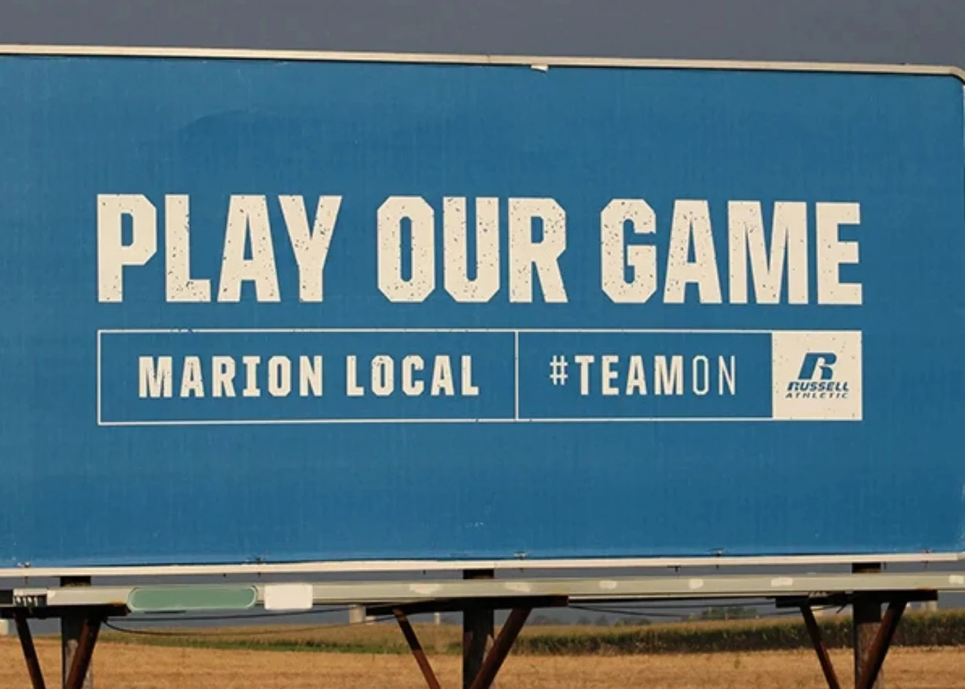 billboard that says play our game