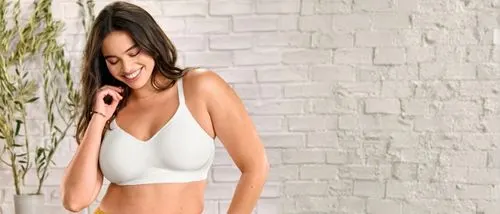 female smiling wearing beyond comfort simple sizing bras