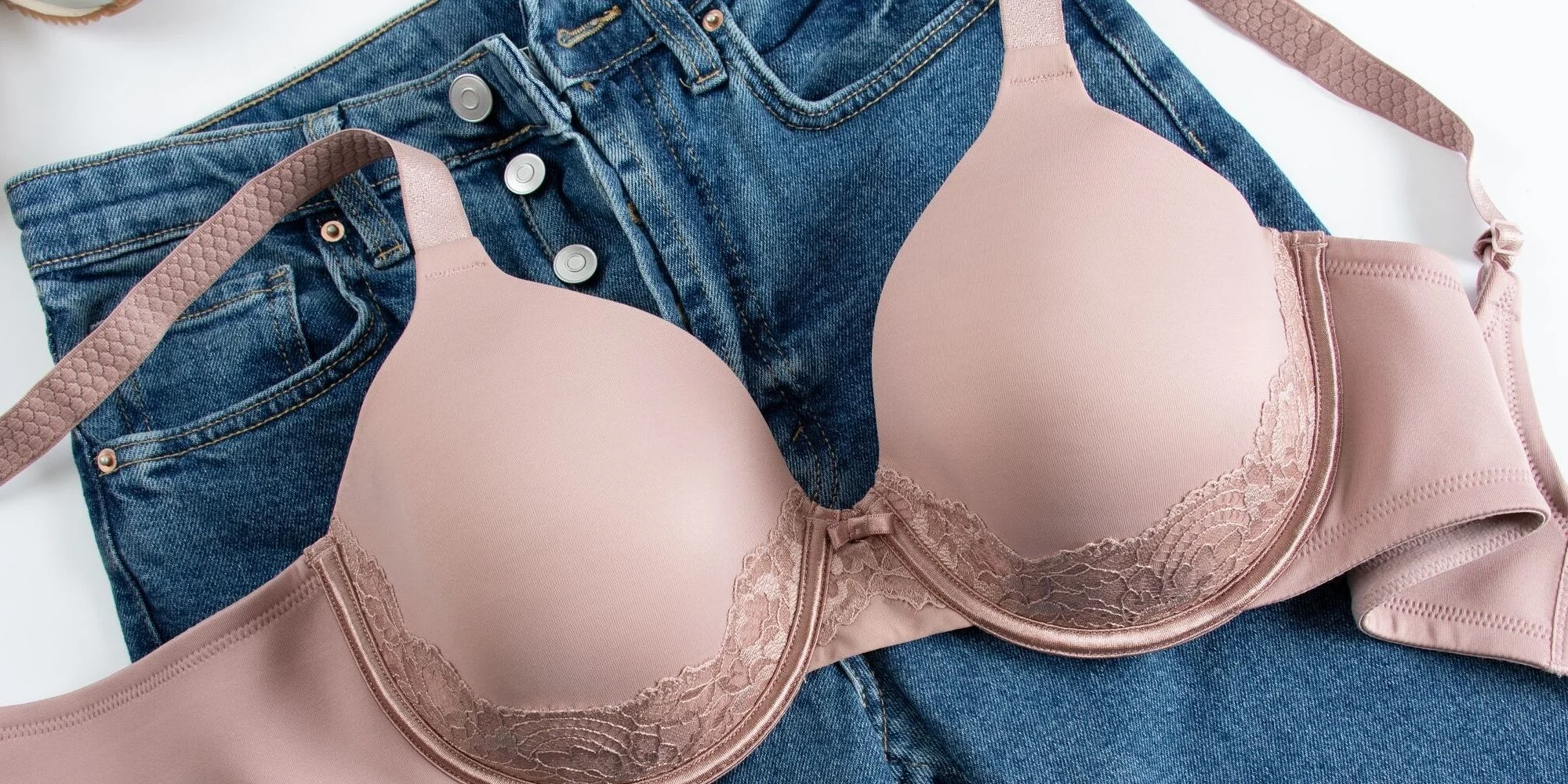 layflat of a full figure beauty back bra and a pair of blue jeans