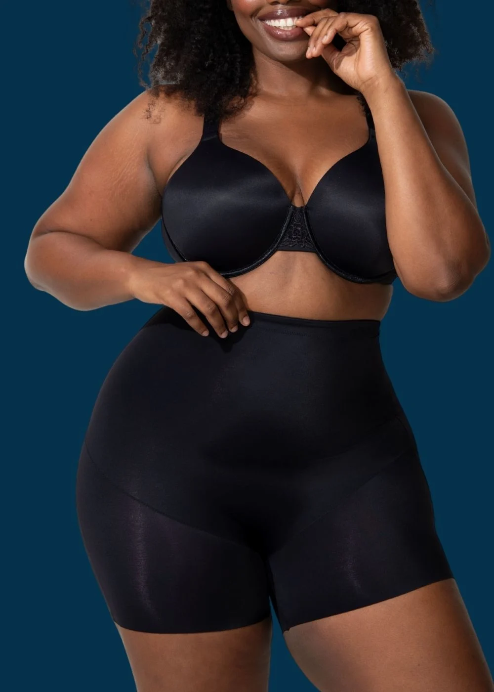 plus size model wearing vanity fair lingerie shaping short 