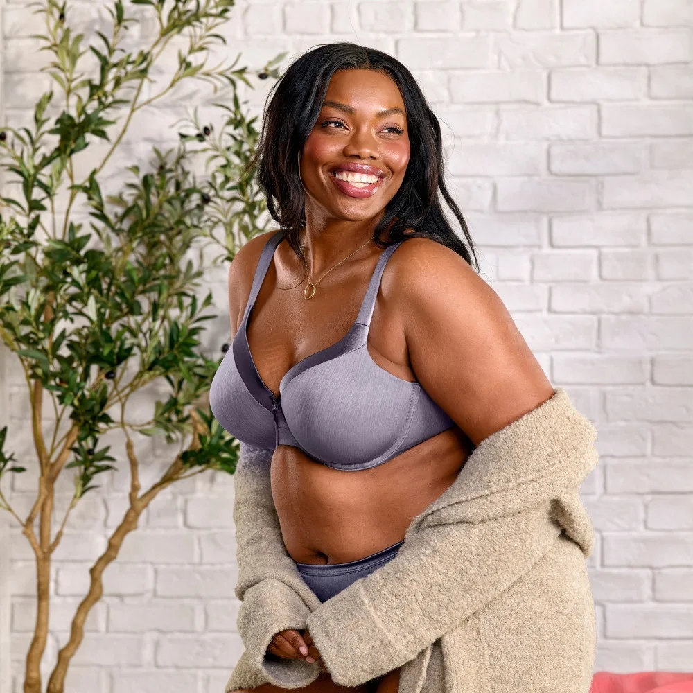 Model wearing Illumination®  Front Close Full Coverage Underwire Bra with lightly lined cups and smooth lace, styled with an orange cardigan showcasing everyday wear.