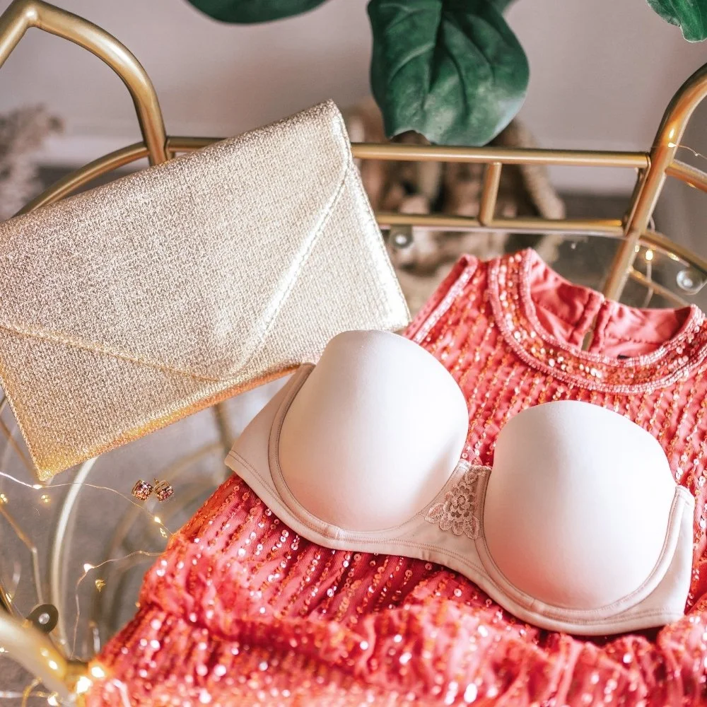 Layflat of strapless bra showing smooth cups and seamless edges.