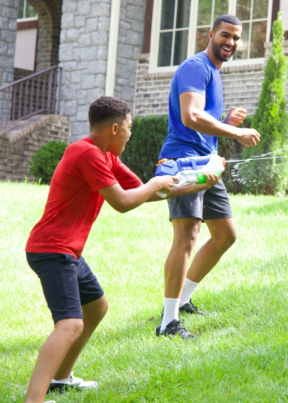 Fruit of the Loom women’s T‑shirt shown in a casual outdoor setting.