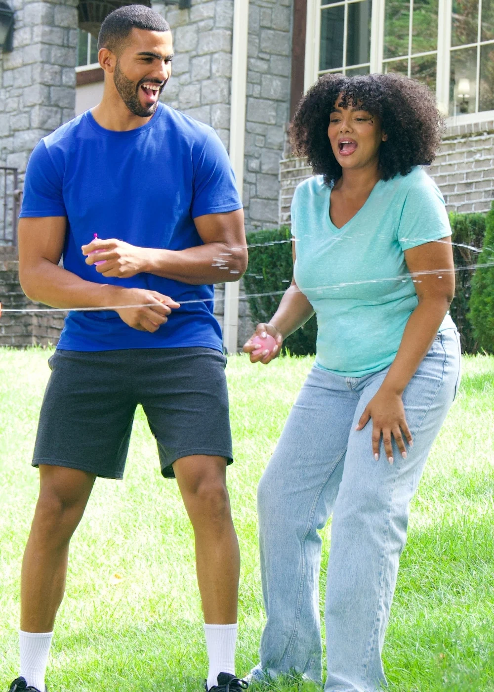 Group wearing Fruit of the Loom T‑shirts during casual outdoor recreation.