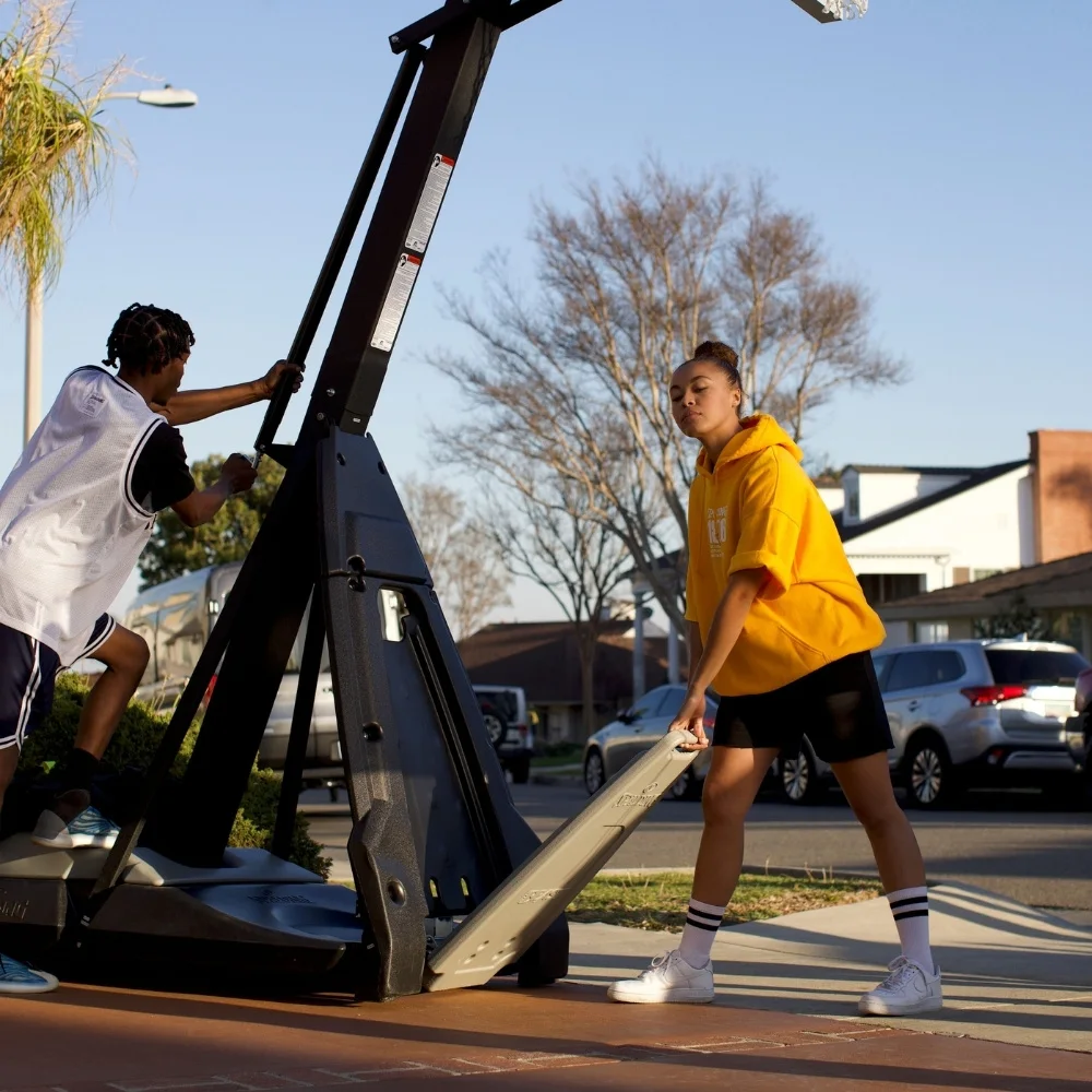 female and male easily moving the portable beast system