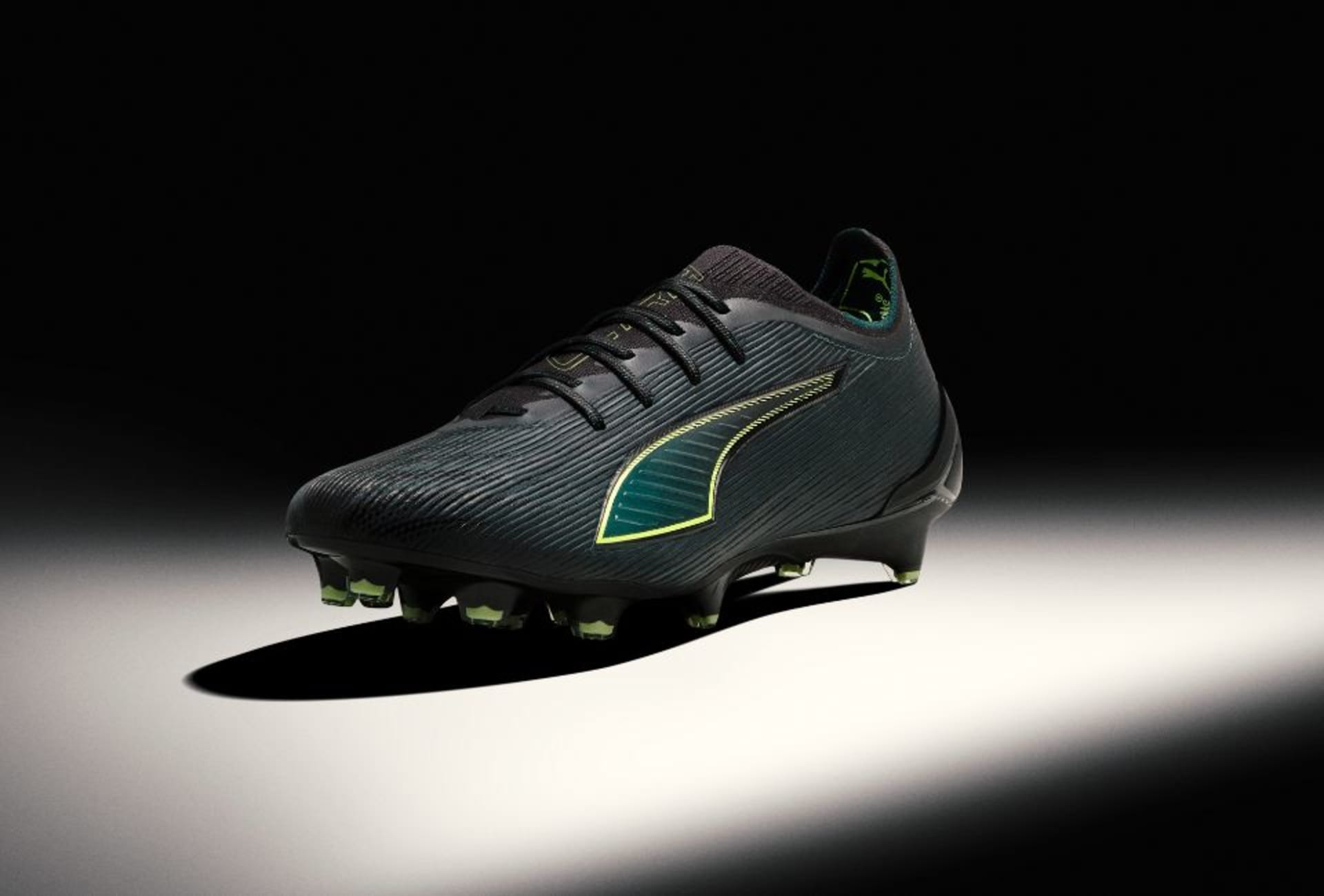 Black football boot from the Puma Eclipse Pack.