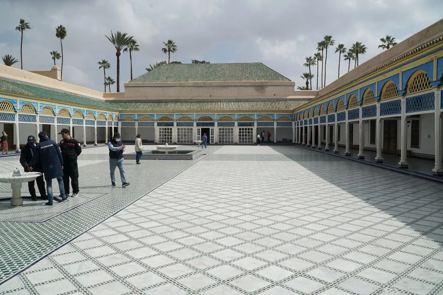 Visitors in the large courtyard of the Bahia Palace in Marrakech