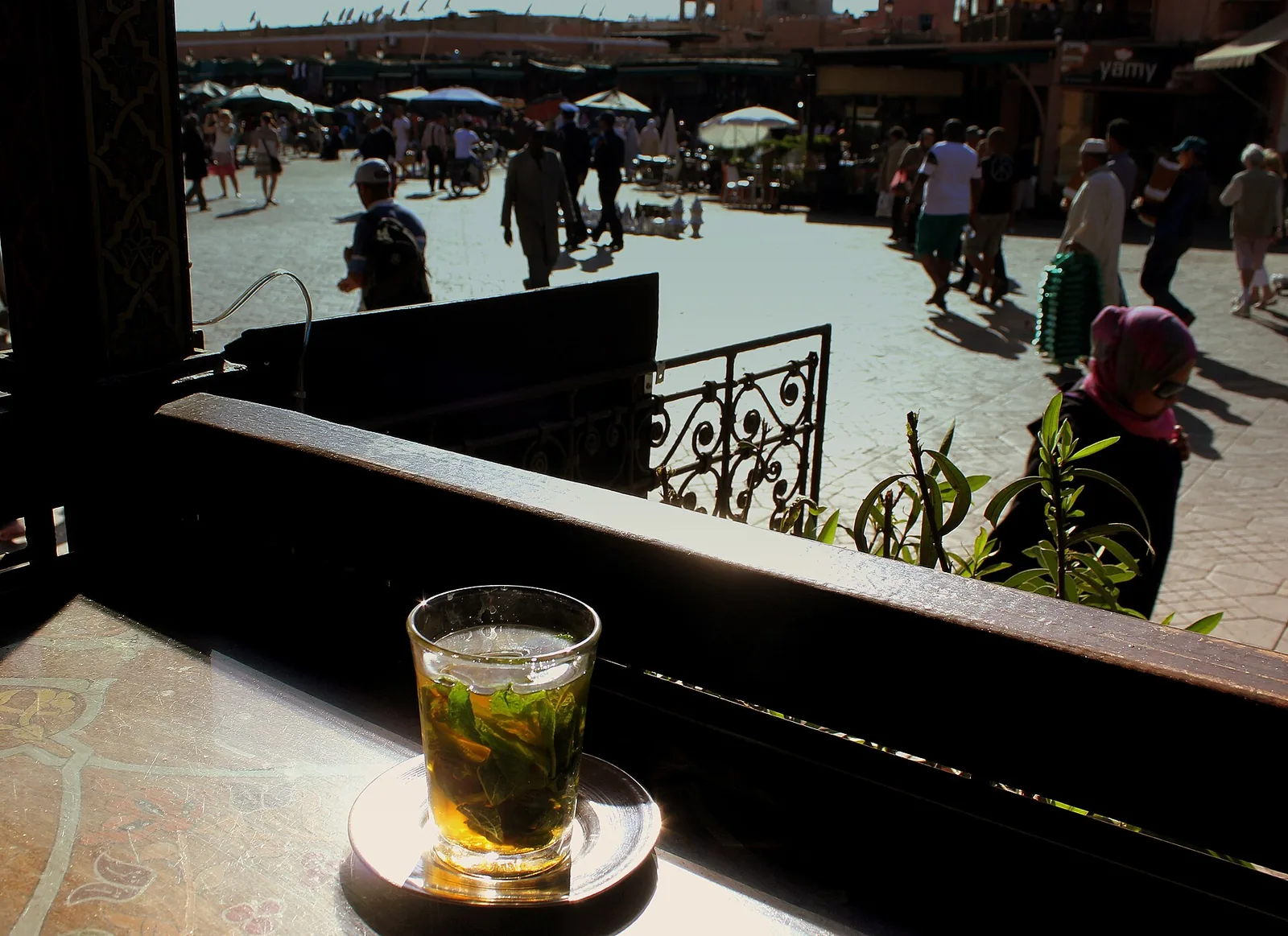 A glass of mint tea on a terrace overlooking Jemaa el-Fna