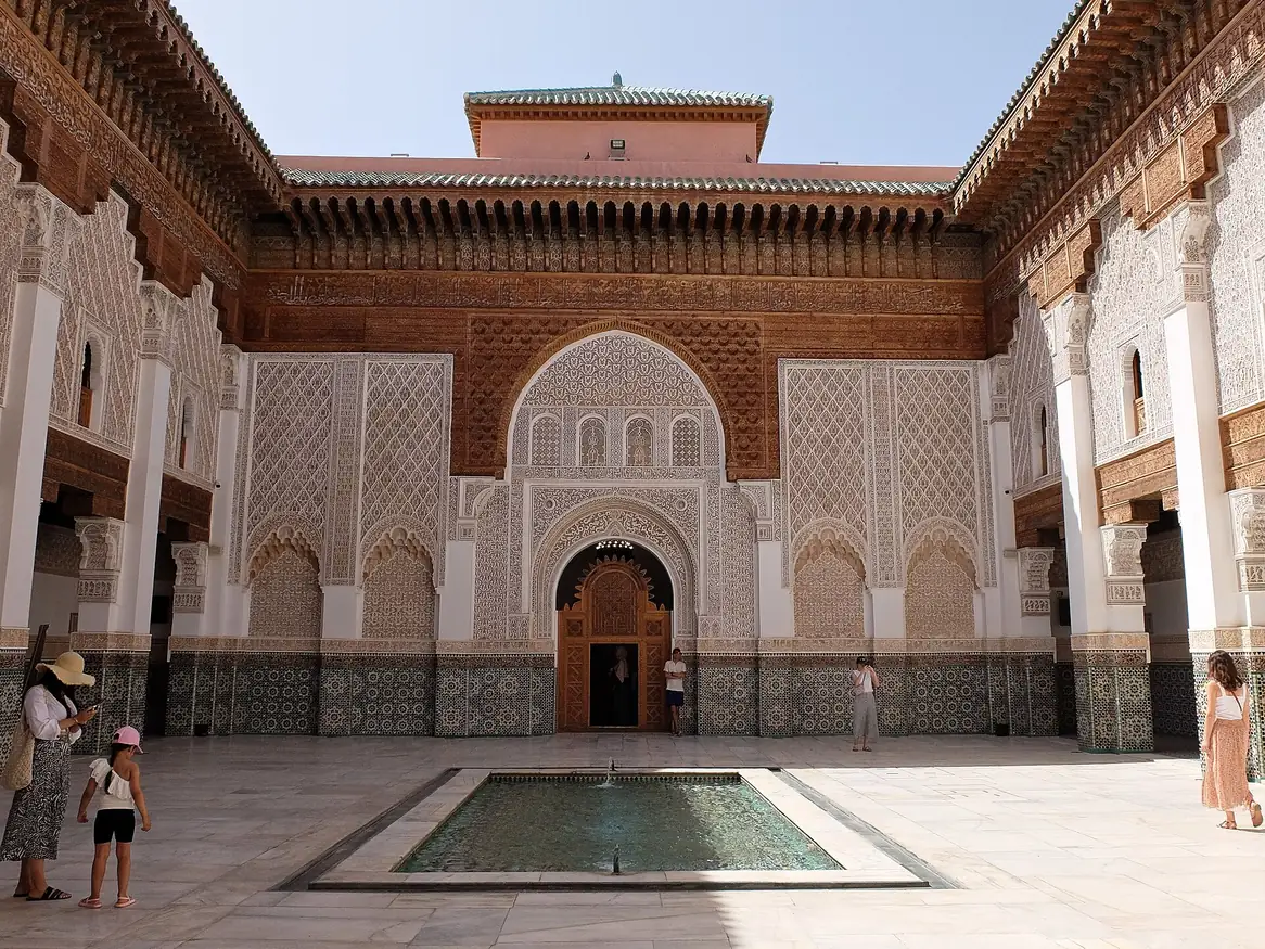 The central courtyard and pool of the Ben Youssef Madrasa in Marrakech