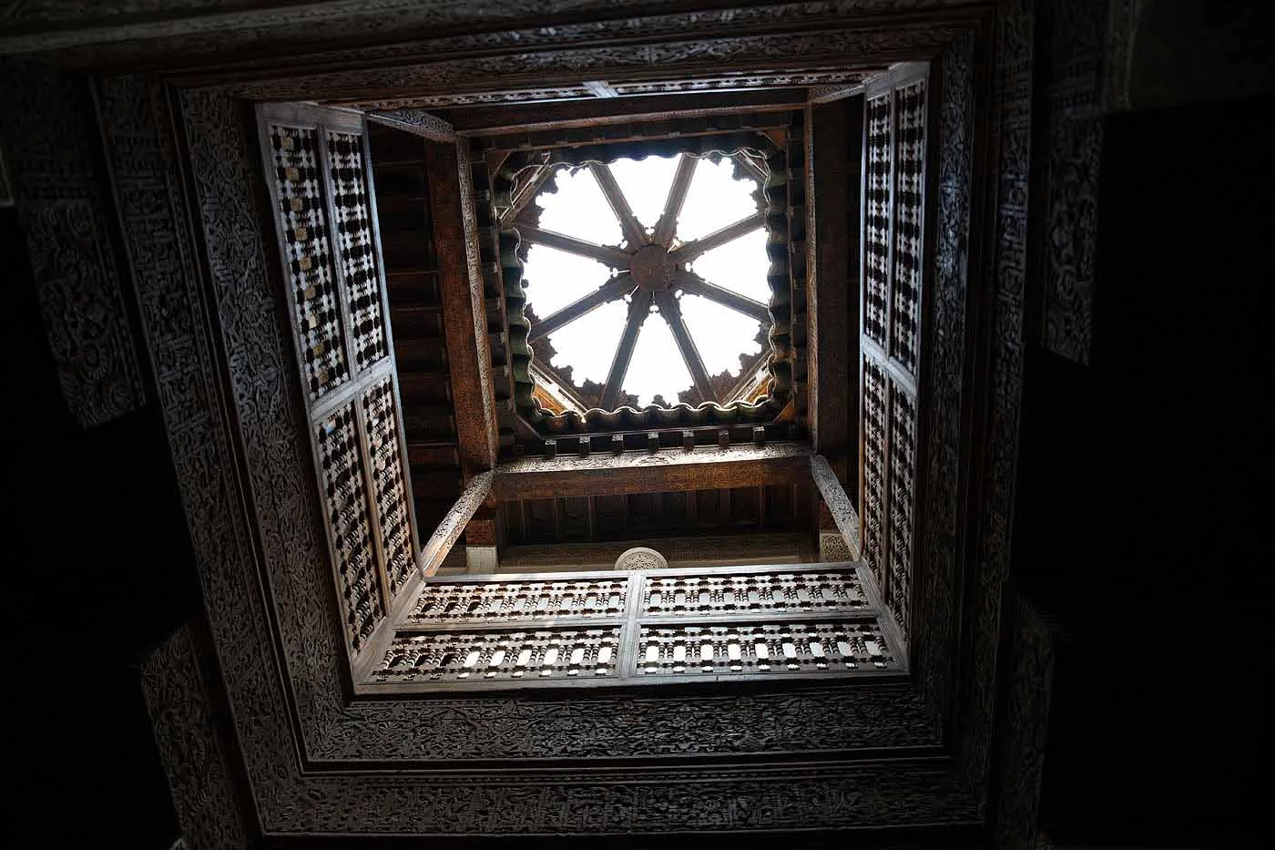 A decorated skylight in the Ben Youssef Madrasa