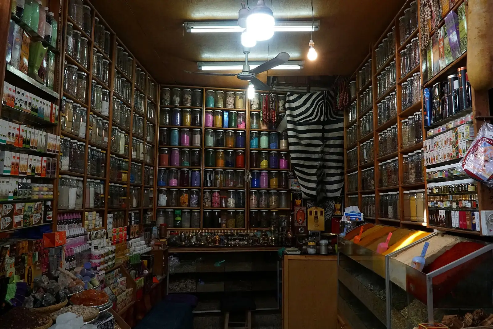 A shop selling dyes and colourants in the Marrakech souks