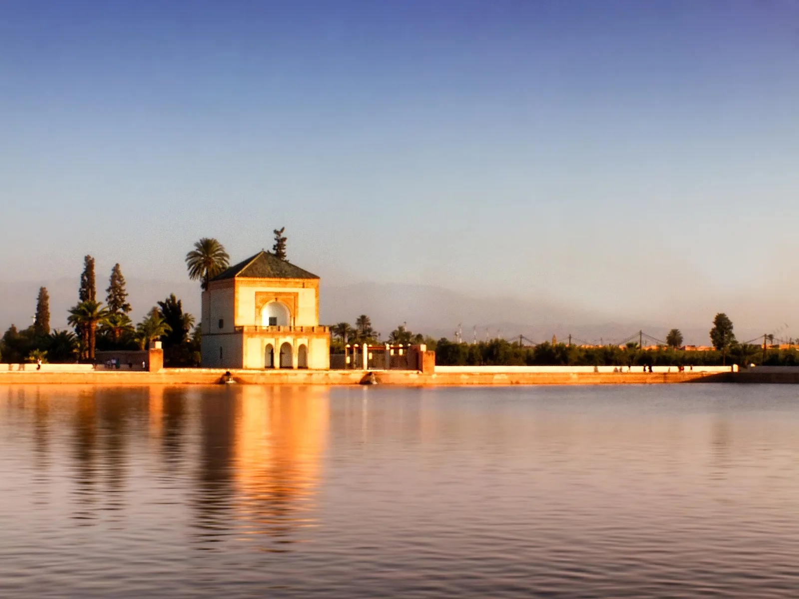 The Menara basin and pavilion in warm evening light
