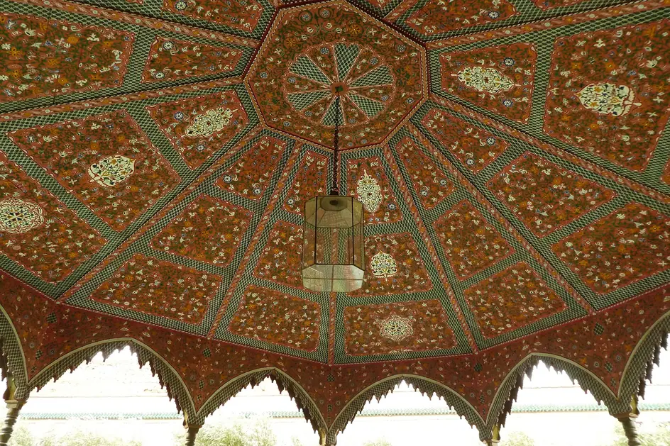 A painted wooden ceiling in a pavilion at Le Jardin Secret