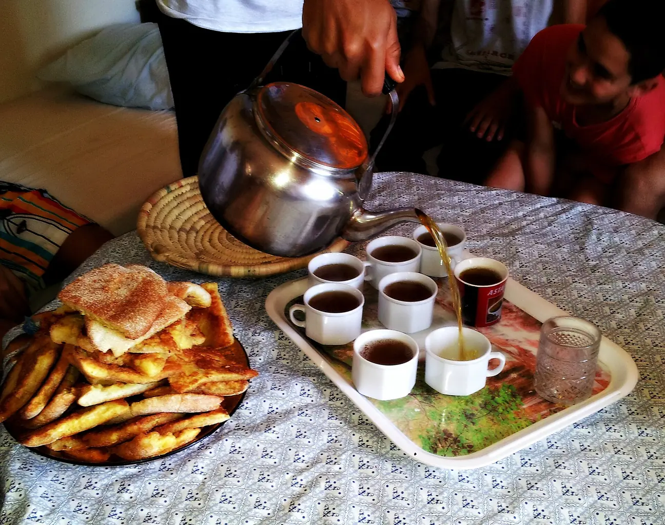 Moroccan breakfast with breads and mint tea