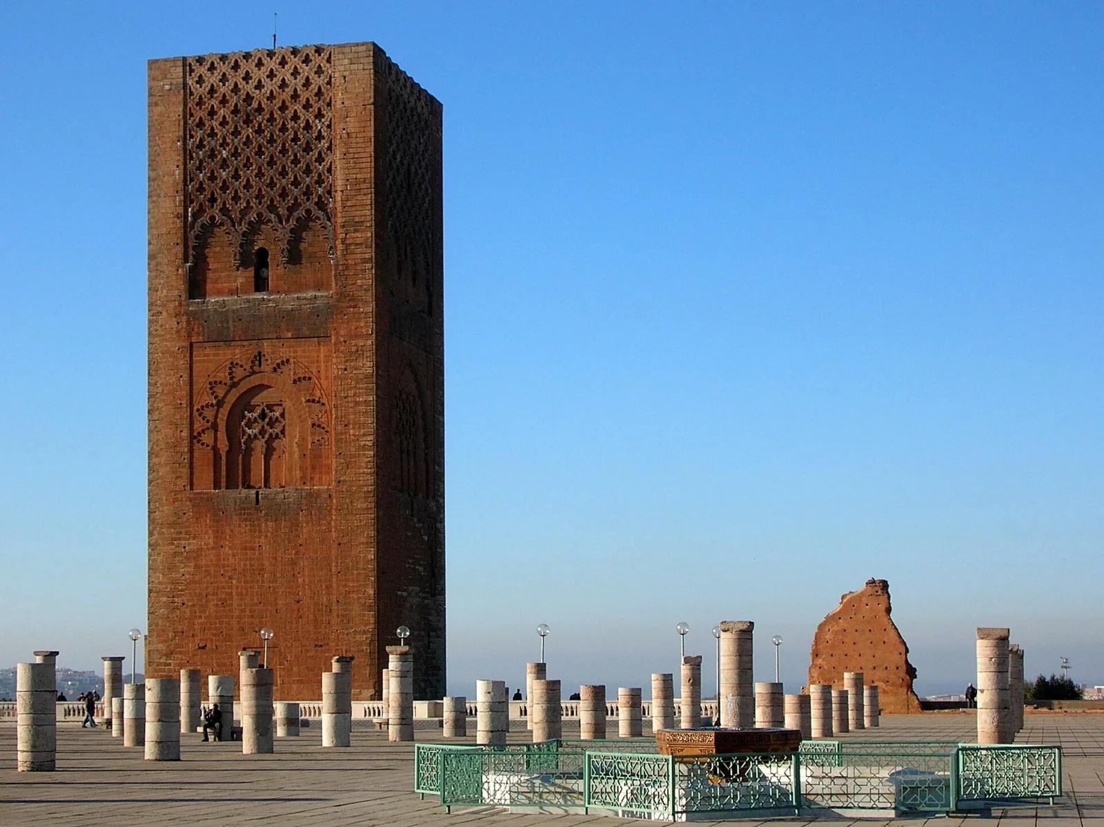 Unfinished minaret of the Hassan Tower against a blue sky