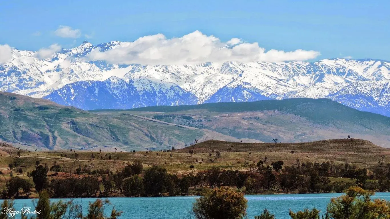 Lalla Takerkoust lake with the snowy Atlas behind